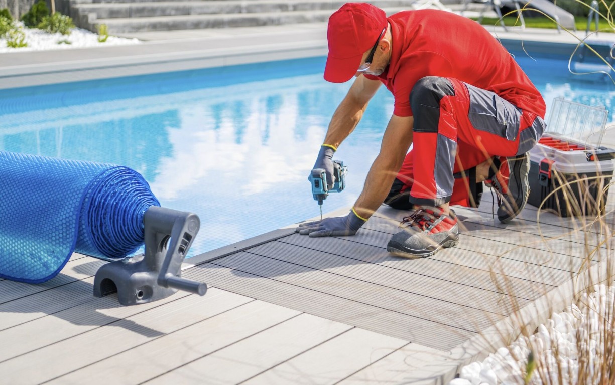 Professional pool technician servicing equipment in Delano, CA
